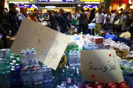 Packages of bottled water are prepared for migrants expected to arrive at the railway station in Frankfurt, Germany, September 5, 2015. REUTERS/Kai Pfaffenbach