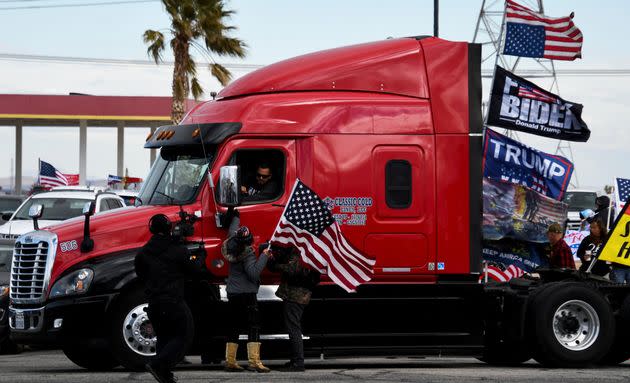 Truckers and their supporters form a convoy in Adelanto, California, bound for the nation's capital to protest COVID-19 vaccine mandates on Feb. 23, 2022. (Photo: Gene Blevins via Reuters)