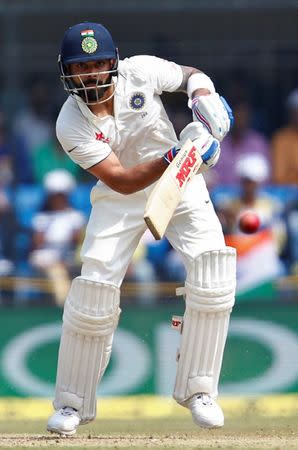 Cricket - India v New Zealand - Third Test cricket match - Holkar Cricket Stadium, Indore, India - 09/10/2016. India's Virat Kohli plays a shot. REUTERS/Danish Siddiqui