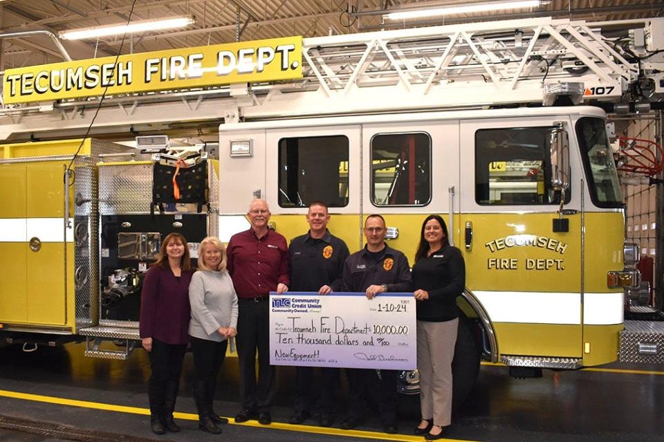 Earlier in January, TLC Community Credit Union donated $10,000 to support the fundraising efforts of the Tecumseh Fire Department in purchasing new, life-saving equipment. A check presentation was held to commemorate the donation. Pictured, during the presentation are, from left to right, Lorie Easton, TLC vice president consumer lending & call center; Linda Tomford, TLC vice president human resources; Jeff Brehmer, TLC president/CEO; Brian Radant, city of Tecumseh Fire Department; Scot Long, fire chief city of Tecumseh Fire Department; and Alisha Morton, TLC vice president mortgage operations.