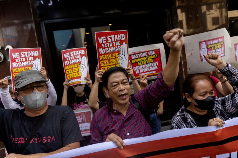 Filipino activists stage a protest in solidarity with Myanmar citizens in Makati City