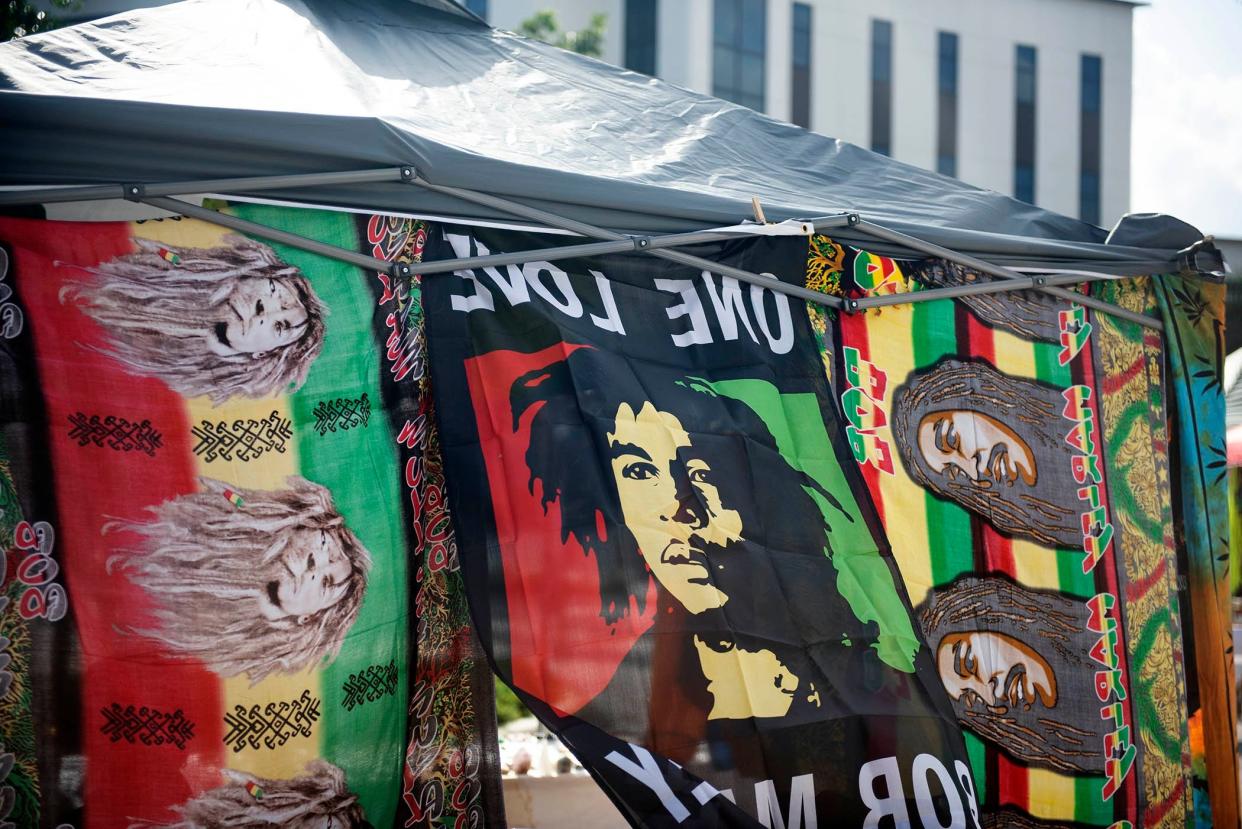 Images of Bob Marley adorn a booth at the Reggae Fest FL at Boynton Beach Amphitheater at Centennial Park Saturday November 12, 2022 in Boyton Beach. 