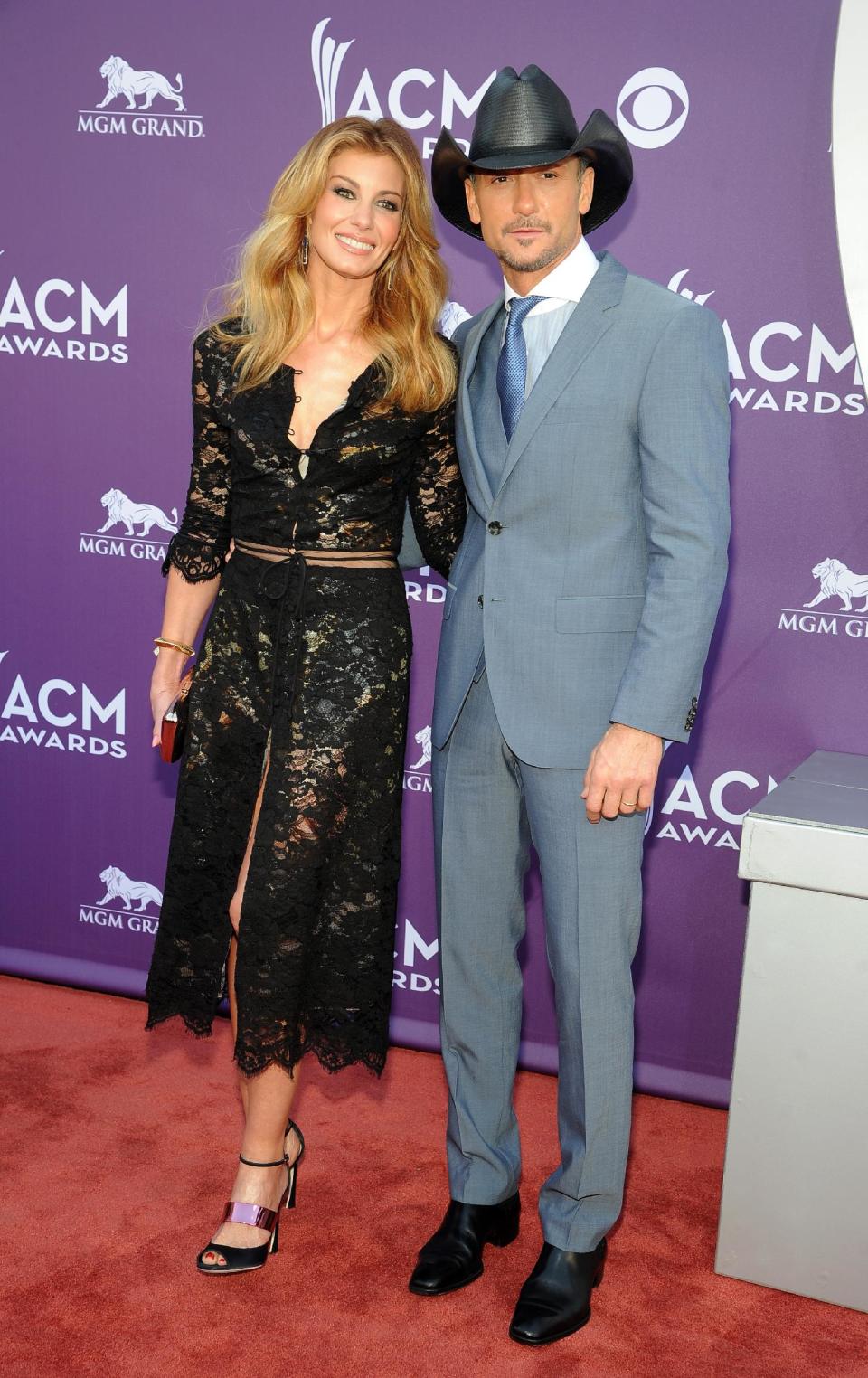 Singers Faith Hill, left, and Tim McGraw arrive at the 48th Annual Academy of Country Music Awards at the MGM Grand Garden Arena in Las Vegas on Sunday, April 7, 2013. (Photo by Al Powers/Invision/AP)