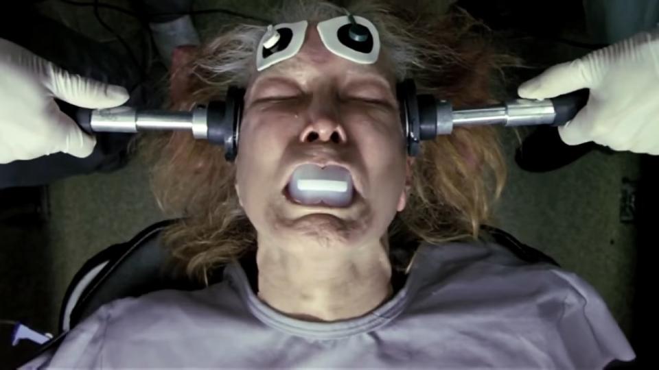 Sara (Ellen Burstyn) gets electroshock treatment with a bite guard in her mouth