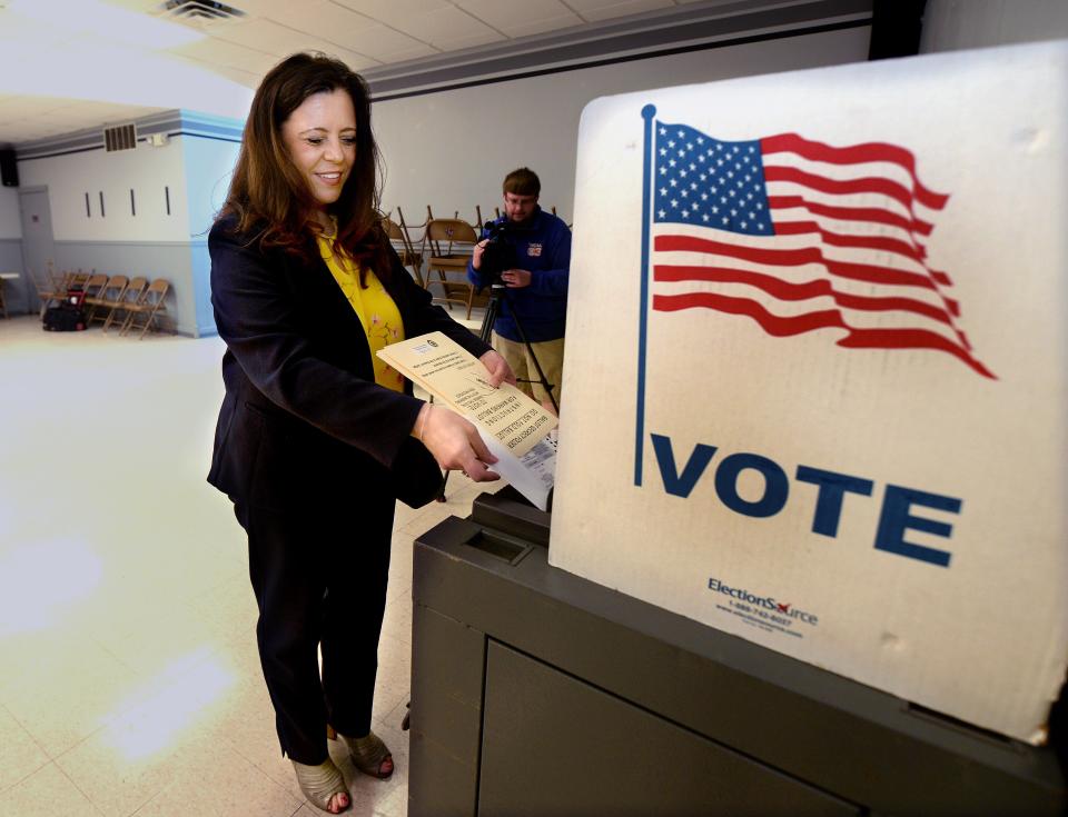 Treasurer and challenger for mayor Misty Buscher votes at the Knights of Columbus on West Street Tuesday, April 4, 2023.