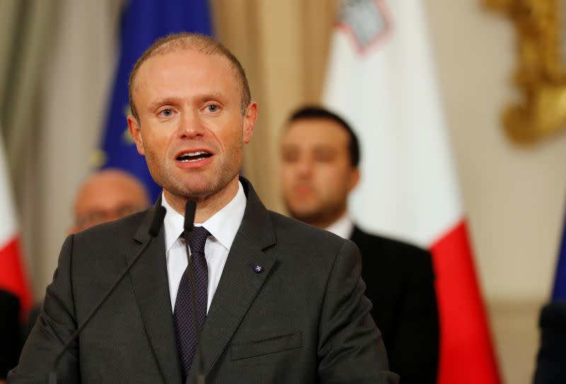 Maltese Prime Minister Joseph Muscat addresses a press conference after an urgent Cabinet meeting at the Auberge de Castille in Valletta