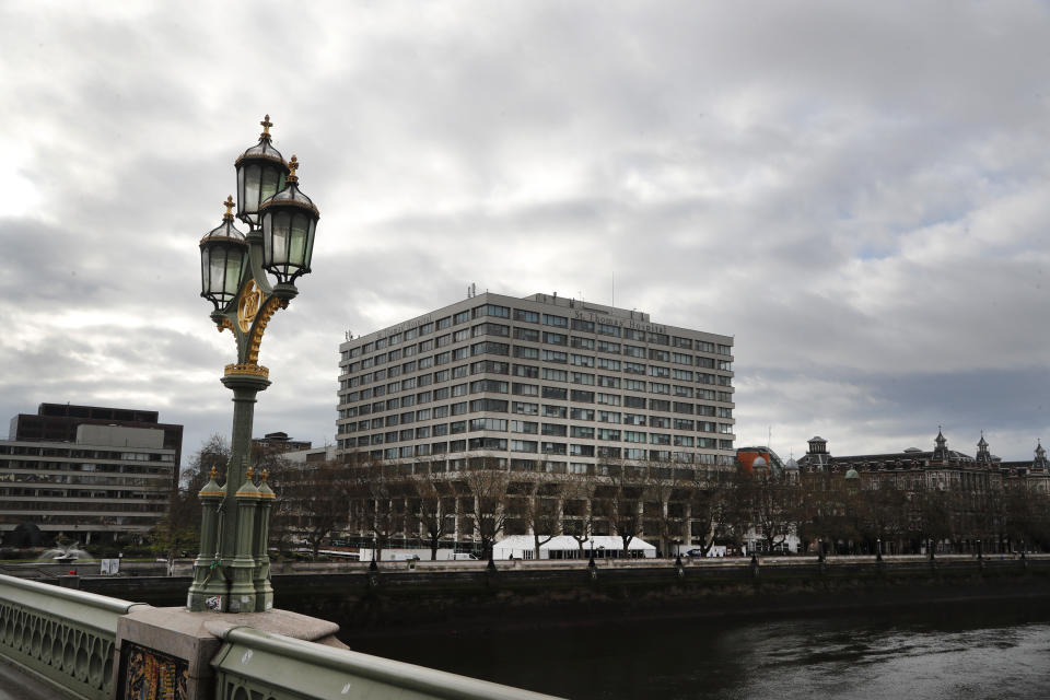 A view of St Thomas' Hospital in Westminster where it is believed but not confirmed that Britain's Prime Minister Boris Johnson is undergoing tests after suffering from coronavirus symptoms, in London, Monday, April 6, 2020. British Prime Minister Boris Johnson has been admitted to a hospital with the coronavirus. Johnson's office says he is being admitted for tests because he still has symptoms 10 days after testing positive for the virus. (AP Photo/Frank Augstein)