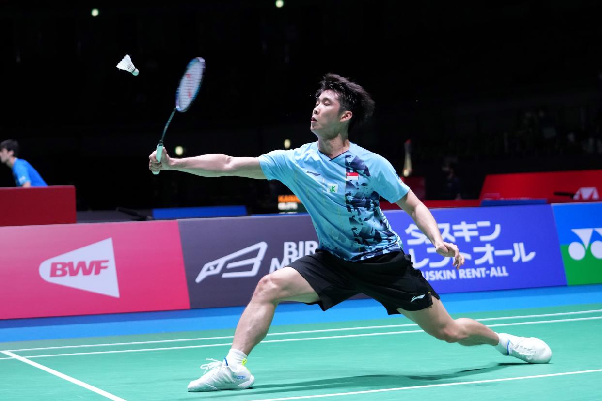 Singapore shuttler Loh Kean Yew hits a return while in action at the Japan Open in August 2022.