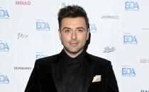 Ein "Robobunny", also ein Kaninchen, welches in einem gelb-schwarzer Roboter im Transformator-Stil sitzt, sang sich in der dritten Staffel des britischen "The Masked Singer" auf den dritten Platz. Darunter zum Vorschein kam Mark Feehily, der früher zur Boygroup Westlife gehörte. (Bild: 2022 Getty Images / Kate Green)