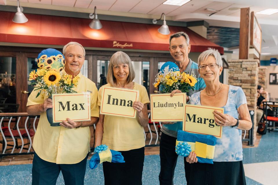 From left to right, Jerry Jahn, Fonda Eyler, John Eyler, and Elizabeth Langland prepare to welcome a Ukrainian family to Florida. They are sponsoring the refugees through the Uniting for Ukraine federal program.