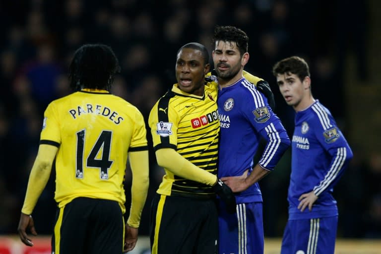 Watford's Odion Ighalo (2nd L) attempts to resolve dispute between between Chelsea's Diego Costa (2R) and Watford's Juan Carlos Paredes during their English Premier League match, at Vicarage Road Stadium in Watford, on February 3, 2016