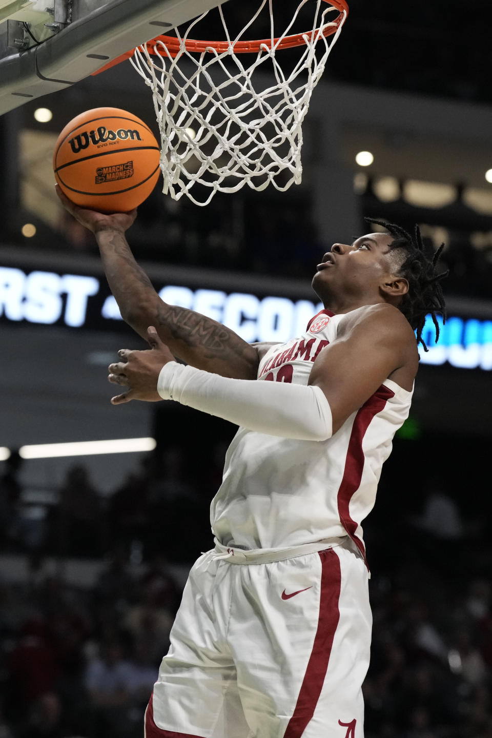 Alabama forward Nick Pringle (23) scores an uncontested lay-up in the second half of a first-round college basketball game against Texas A&M-Corpus Christi in the NCAA Tournament in Birmingham, Ala., Thursday, March 16, 2023. Alabama won 96-75. (AP Photo/Rogelio V. Solis)