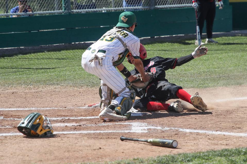 Coachella Valley tags out a runner in the first inning against San Bernadino in the CIF Division VIII tournament in Coachella, Calif., May 10, 2024.