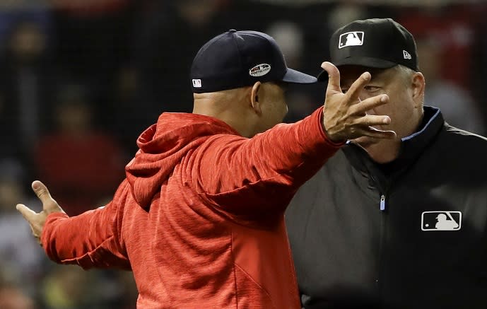 Red Sox manager Alex Cora was ejected after disputing a questionable strike call during ALCS Game 1. (AP)