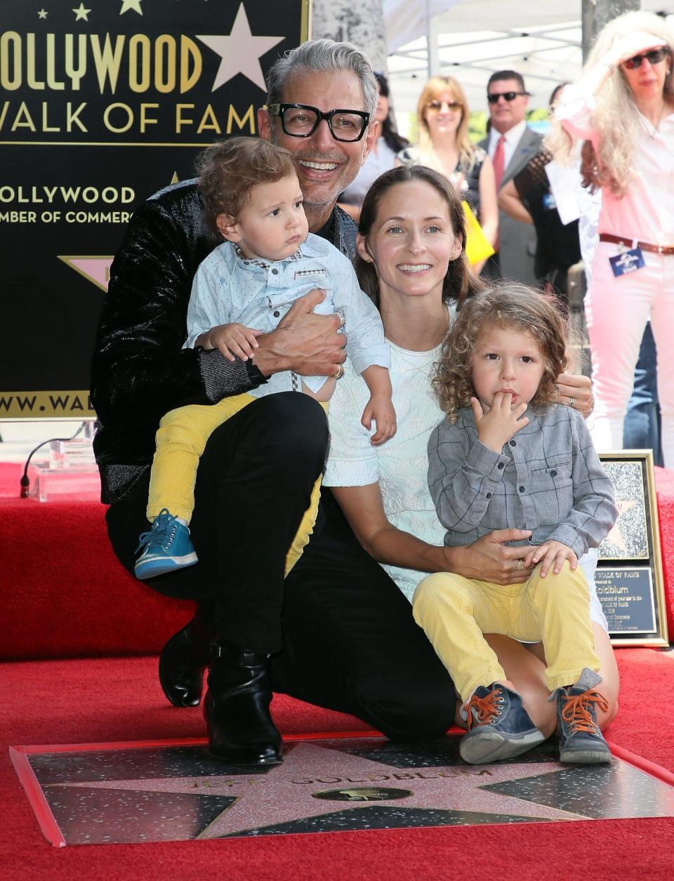 A photo of Jeff Goldblum with his wife and their two sons