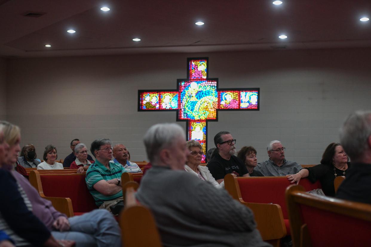 Retirees from University Hospital sit in the audience at Pine View Baptist Church on Tuesday, Feb. 27, 2024.