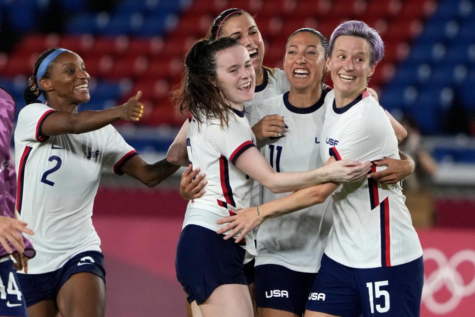 United States players celebrate after defeating Netherlands in a penalty shootout in the quarterfinals of the Tokyo Games.
