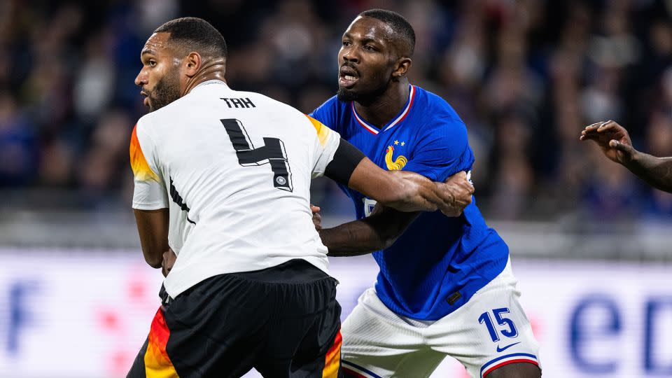 Jonathan Tah, who plays for Germany, is seen in the jersey during a friendly match with France in March. - Markus Gilliar/GES Sportfoto/Getty Images