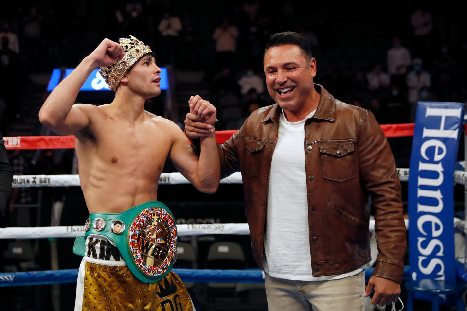 DALLAS, TEXAS - JANUARY 02:  Ryan Garcia is congratulated by Oscar De La Hoya after the WBC Interim Lightweight Title fight against Luke Campbell at American Airlines Center on January 02, 2021 in Dallas, Texas. (Photo by Tim Warner/Getty Images)