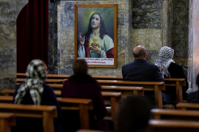 A picture of Jesus Christ is seen on the wall of the Grand Immaculate old Church in Qaraqosh