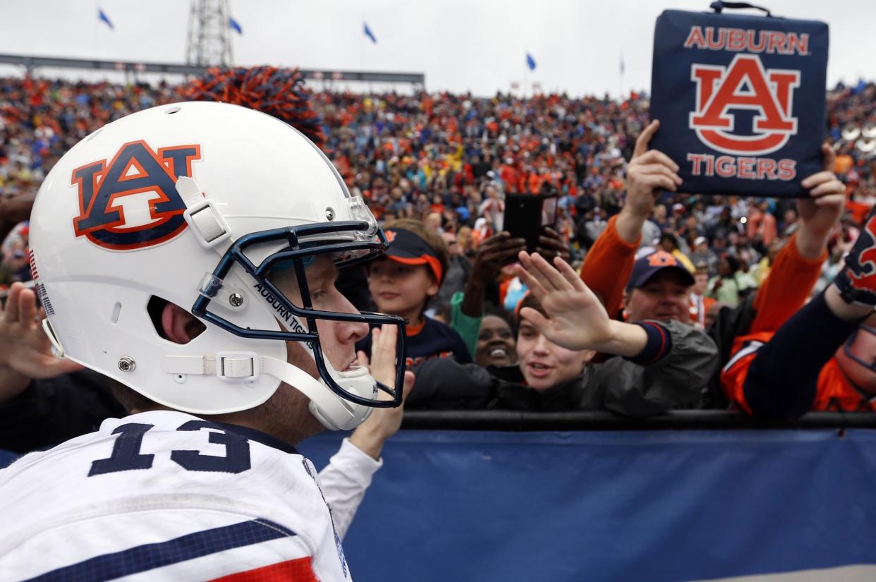 Sean White led Auburn to win over Memphis in the Birmingham Bowl. (AP Photo/Butch Dill)