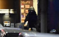 A bomb disposal expert leaves the Lindt cafe after a hostage siege in Sydney on December 16, 2014