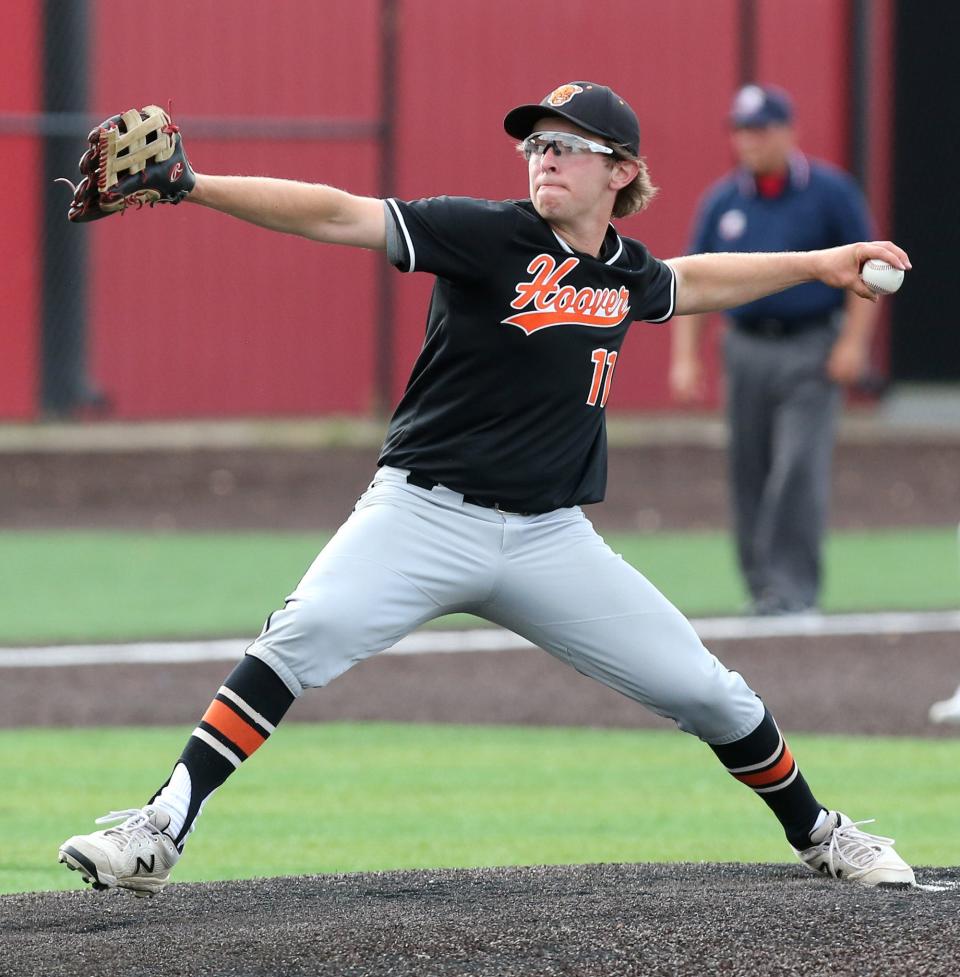 Nick Vardavas of Hoover delivers a pitch during a Division I district semifinal against Dover at Thurman Munson Memorial Stadium on Tuesday. Hoover won 3-0.