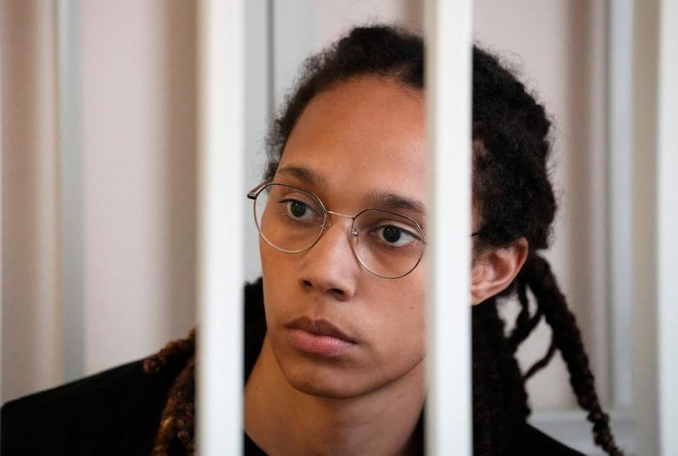 US WNBA basketball superstar Brittney Griner sits inside a defendants' cage before a hearing at the Khimki Court outside Moscow on 27July (AFP/Getty)