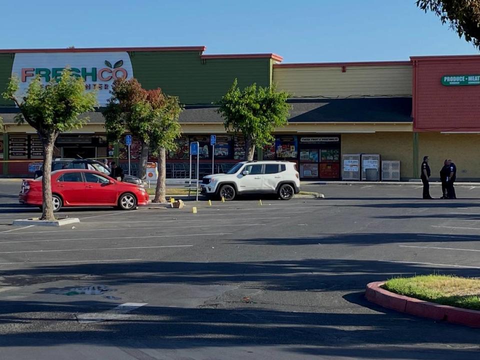 Fresno police investigate the scene of a fatal shooting in a parking lot on Shields and Brawley avenues on Wednesday, May 18, 2022.