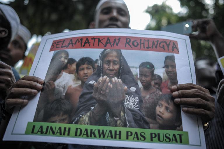 Ethnic Rohingya refugees residing in Malaysia protest outside Myanmar's embassy in Kuala Lumpur, on May 21, 2015, demanding Yangon to end the persecution and ill-treatment of the Rohingya community