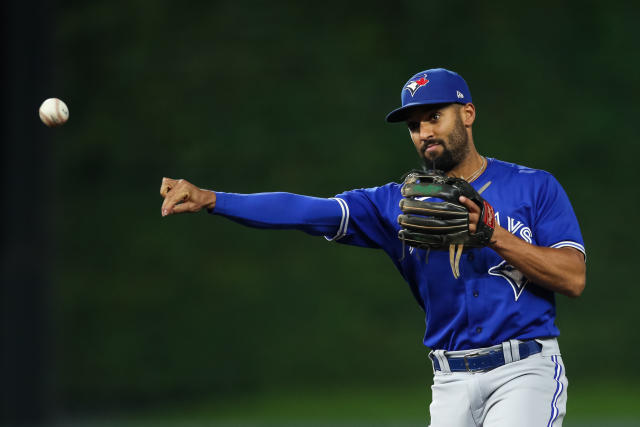 Marcus Semien of the Texas Rangers throws to first base in the first  News Photo - Getty Images