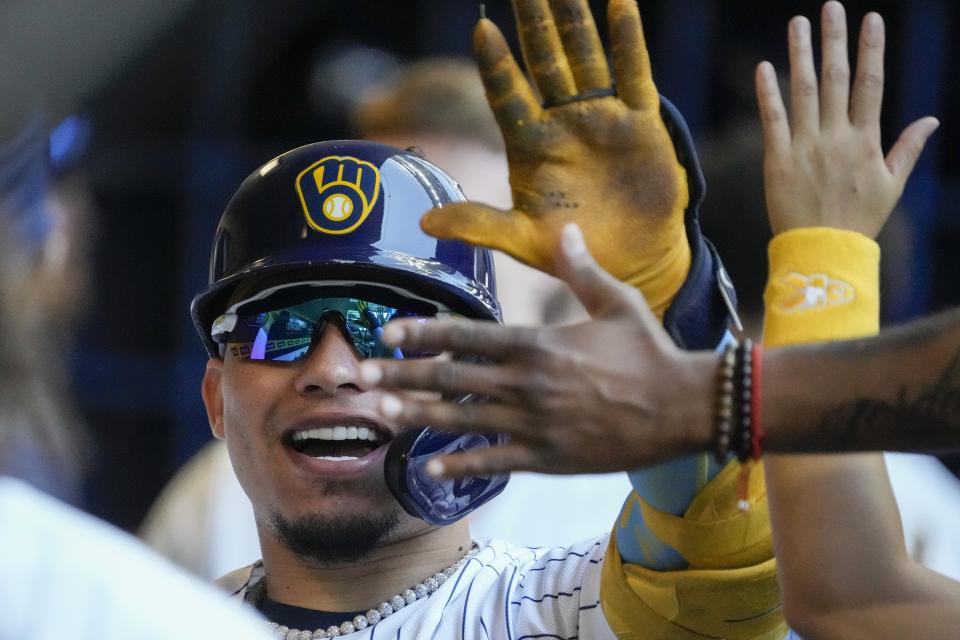 Milwaukee Brewers' William Contreras reacts after hitting a home run during the first inning of a baseball game against the Philadelphia PhilliesSunday, Sept. 3, 2023, in Milwaukee. (AP Photo/Morry Gash)