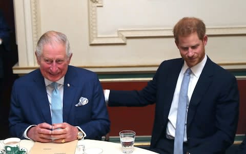 Prince Harry supports his father Prince Charles at a meeting about youth violence - Credit: PA