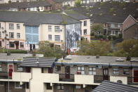 In this photo dated Monday Oct. 14, 2019 a Republican mural depicting scenes from Bloody Sunday in 1972 on a wall in the bogside area of Londonderry, Northern Ireland. Fears about a return to the violence that killed more than 3,500 people over three decades have made Northern Ireland the biggest hurdle for U.K. and EU officials who are trying to hammer out a Brexit divorce deal. (AP Photo/Peter Morrison)