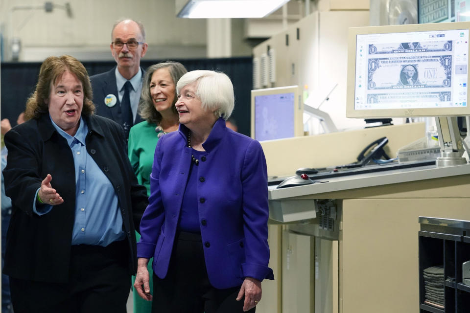 Secretary of the Treasury Janet Yellen, right, and Treasurer of the United States Chief Lynn Malerba, second from right get a tour of the Bureau of Engraving and Printing's (BEP) Western Currency Facility from Deputy Director Charlene Williams and Director Leonard Olijar in Fort Worth, Texas, Thursday, Dec. 8, 2022. Yellen unveiled the first U.S. currency bearing her signature, marking the first time that U.S. bank notes will bear the name of a female treasury secretary. (AP Photo/LM Otero)