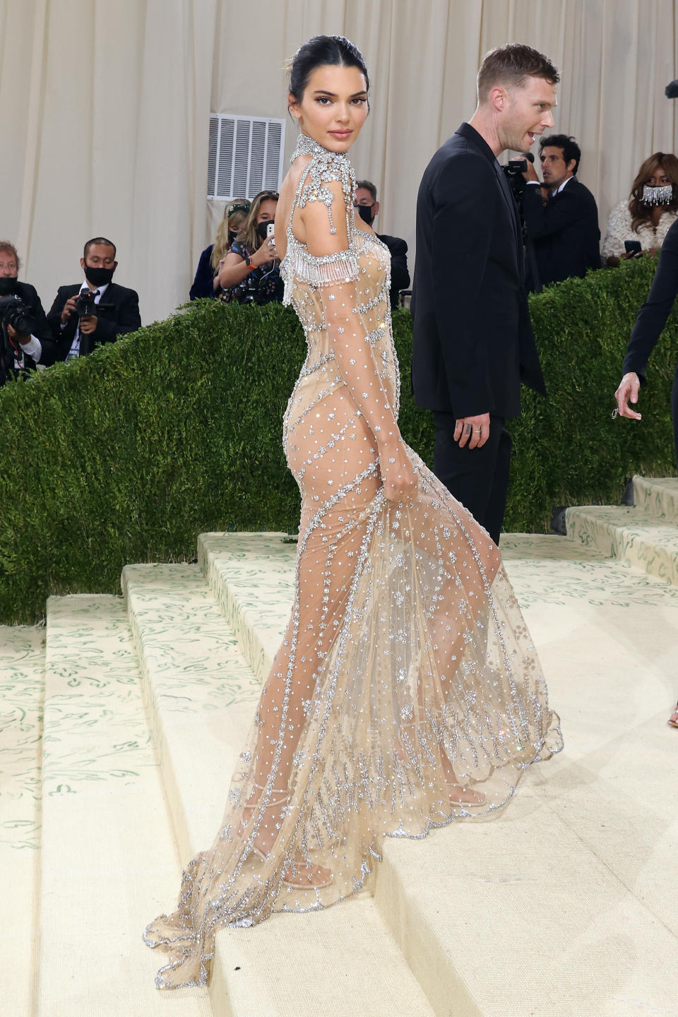 Kendall Jenner wears a sheer silver dress at the 2021 Met Gala benefit 