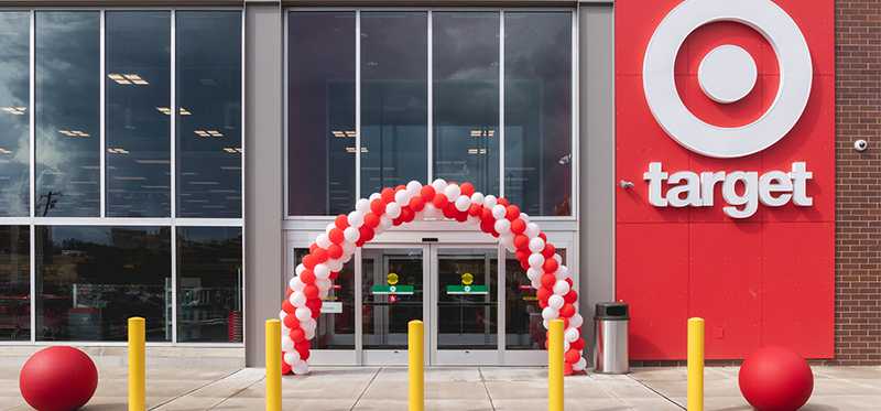 A Target entrance with a balloon arch near the doorway.