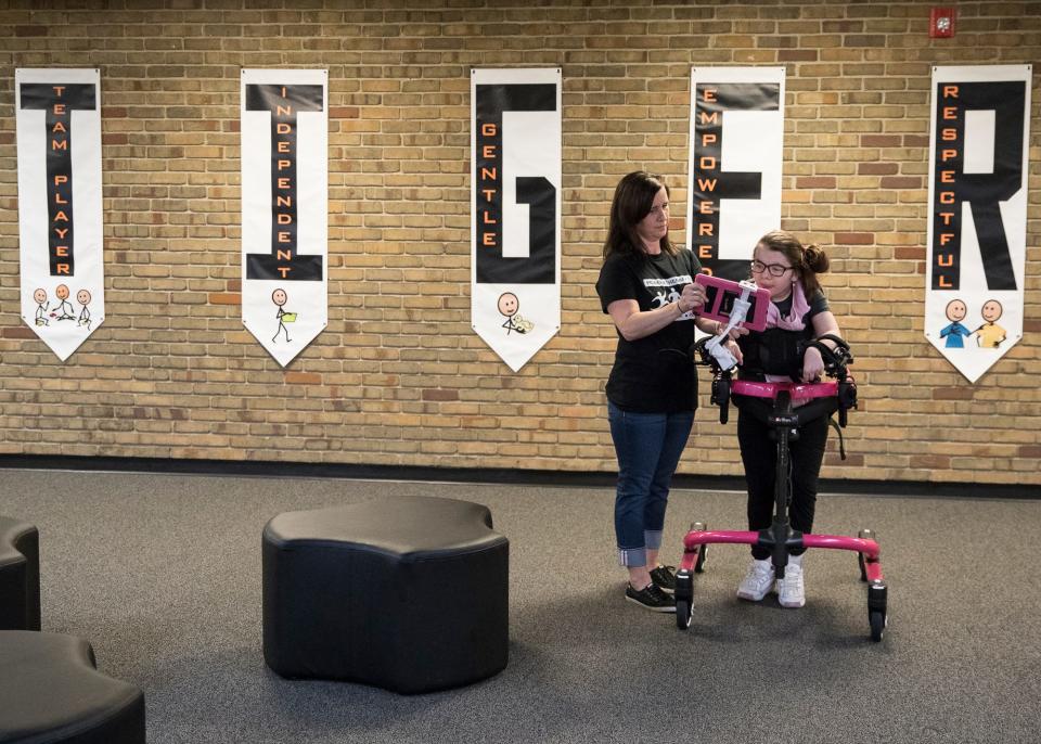 Pioneer student Averi Runyon and physical therapist Sonya Mitchell at the Pioneer Summer Therapy Program on June 20, 2019.