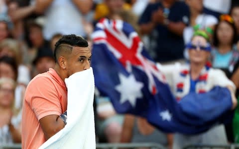 Nick Kyrgios and an Australian flag