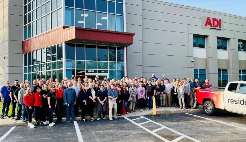 Employees ribbon cutting the new Resideo office in Louisville.