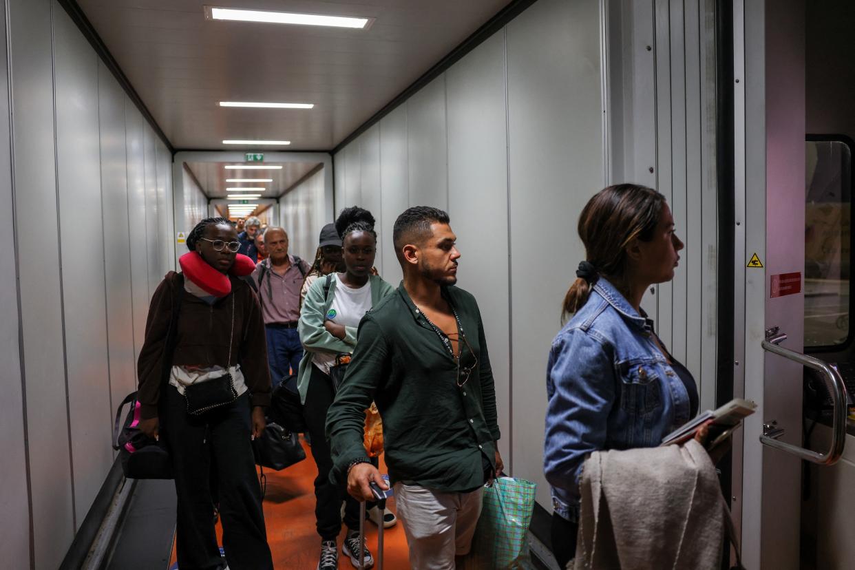 Foreigners are evacuated on a special Aegean Airlines flight in Marrakech (REUTERS)