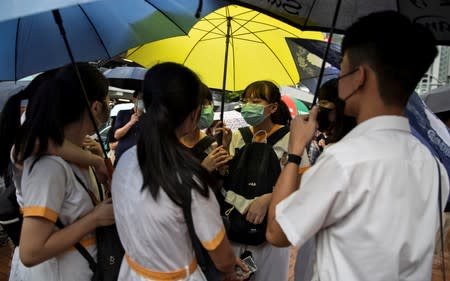 School students boycott their classes as they take part in a protest in Hong Kong