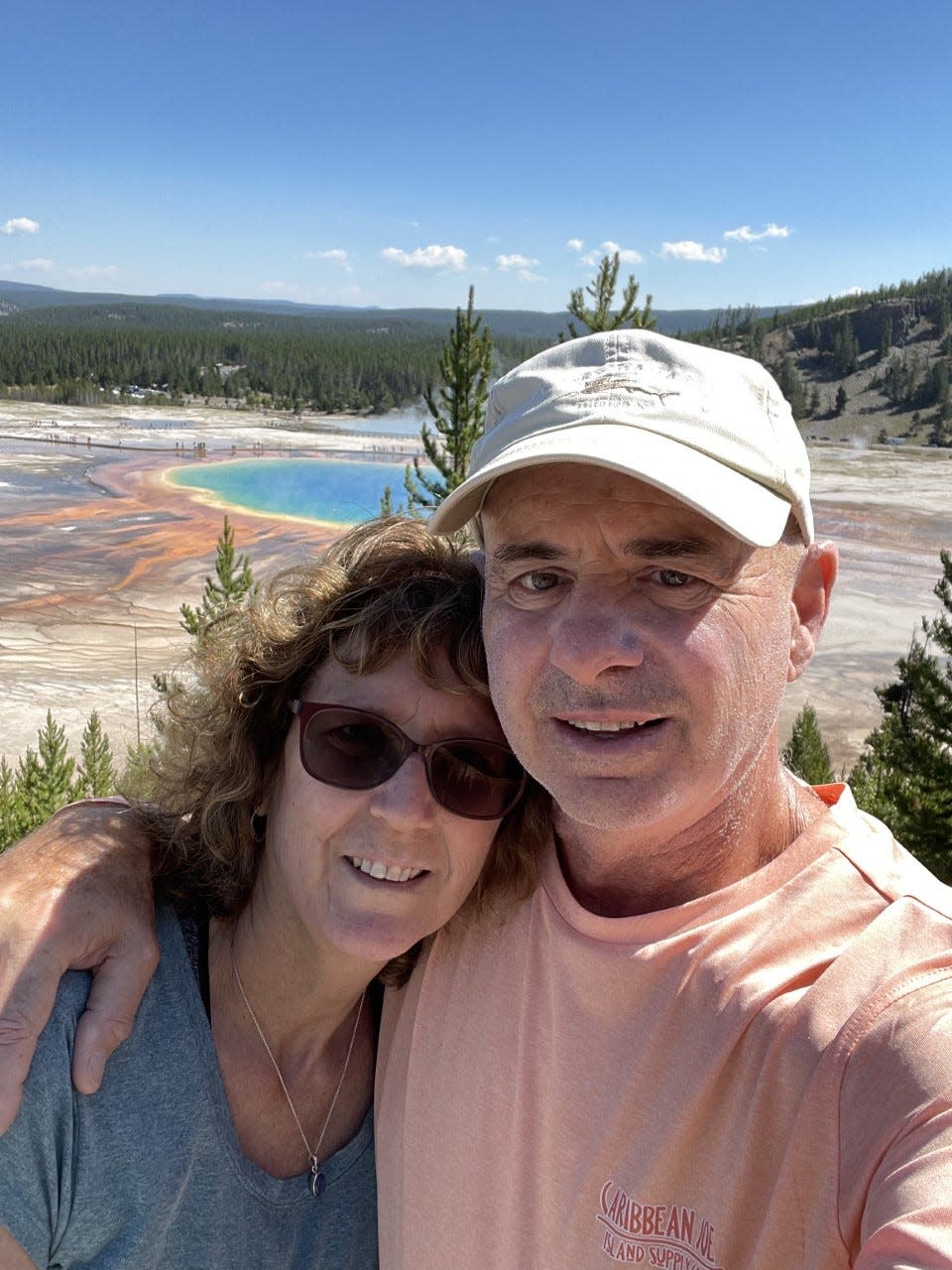 Renee and Tom D'Angelo at Grand Prismatic Spring in Yellowstone National Park.