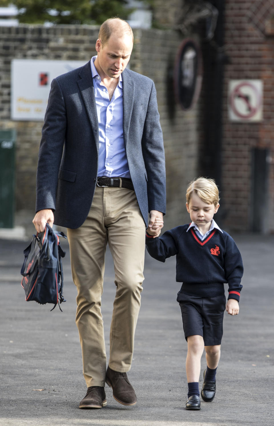 Prince George with his father, the Duke of Cambridge, on his first day of school in 2017. [Photo: PA]