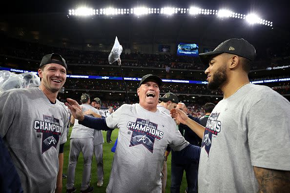 HOUSTON, TEXAS - NOVEMBER 02:  Manager Brian Snitker #43 of the Atlanta Braves celebrates the team's 7-0 victory against the Houston Astros in Game Six to win the 2021 World Series at Minute Maid Park on November 02, 2021 in Houston, Texas. (Photo by Elsa/Getty Images)