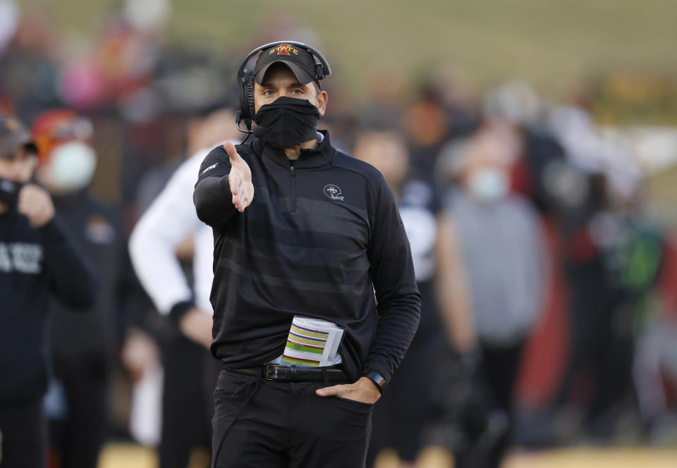 Iowa State head coach Matt Campbell gestures to an official after a call along the sideline during the first half of an NCAA college football game against West Virginia, Saturday, Dec. 5, 2020, in Ames, Iowa. (AP Photo/Matthew Putney)