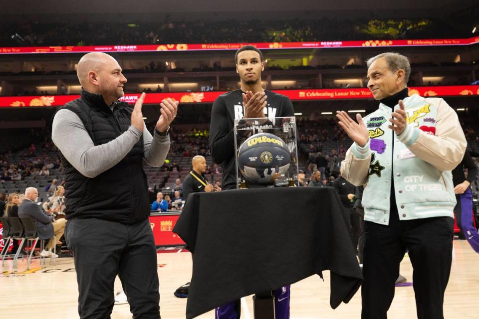 Sacramento Kings forward Keegan Murray (13) is honored for his NBA All-Star selection by General Manager Monte McNair and owner Vivek Ranadive during against the Denver Nuggets on Feb. 9 at Golden 1 Center.