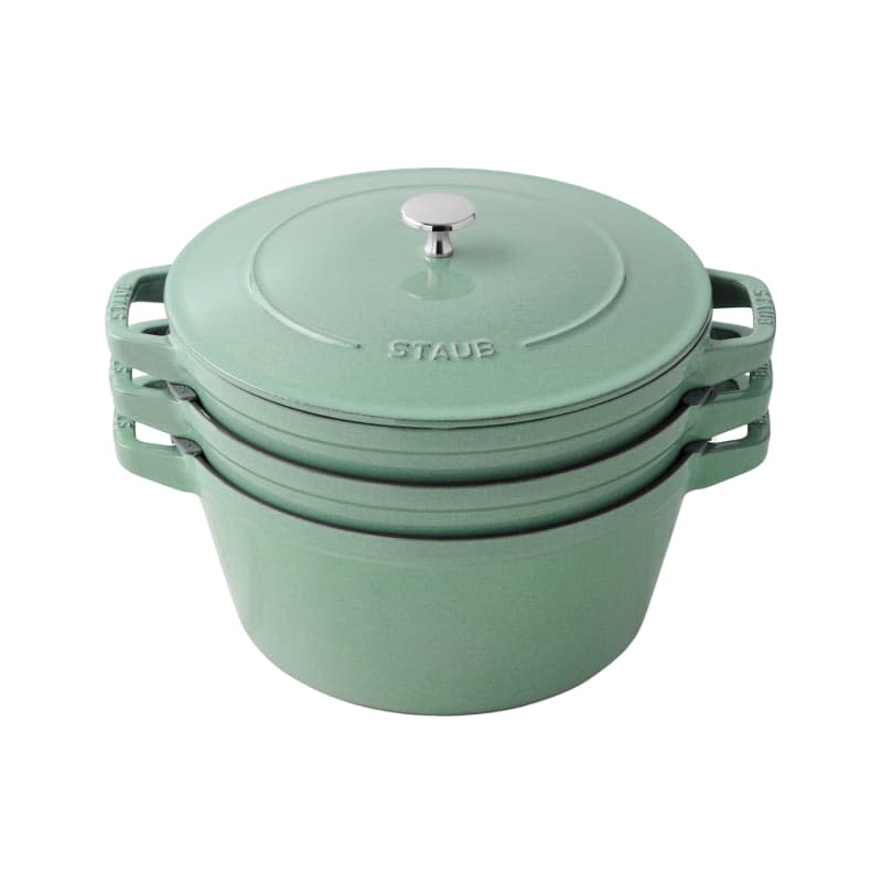 Light sage green staub stackable dutch oven pots
