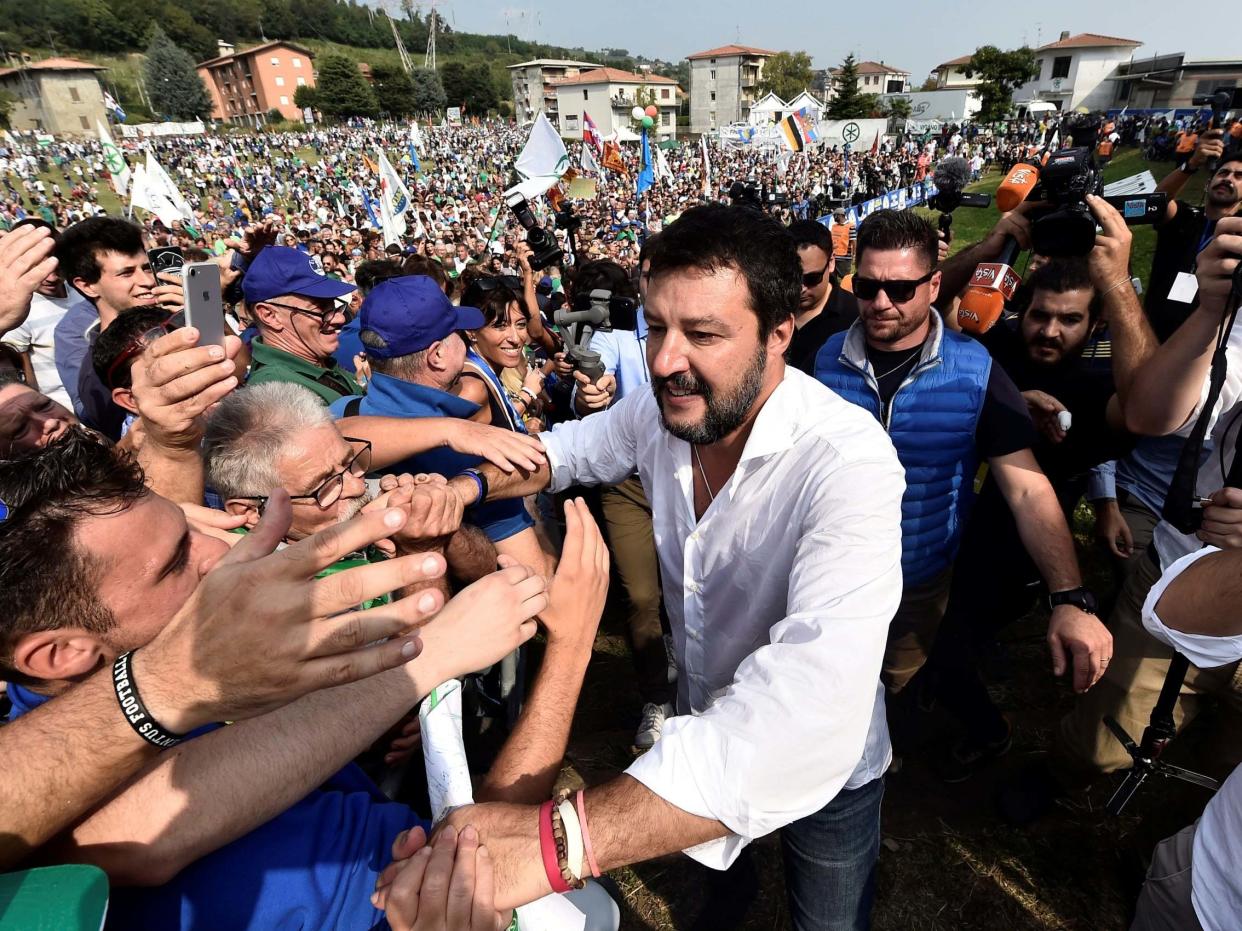 League party leader Matteo Salvini greets supporters during a packed rally in Pontida, Italy on 15 September: Reuters/Flavio Lo Scalzo