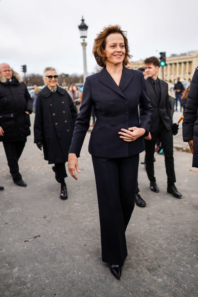 Wear a black pantsuit at Paris Fashion Week